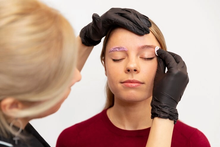 beautiful-young-woman-going-through-microblading-treatment