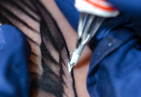 pin needle tattoo